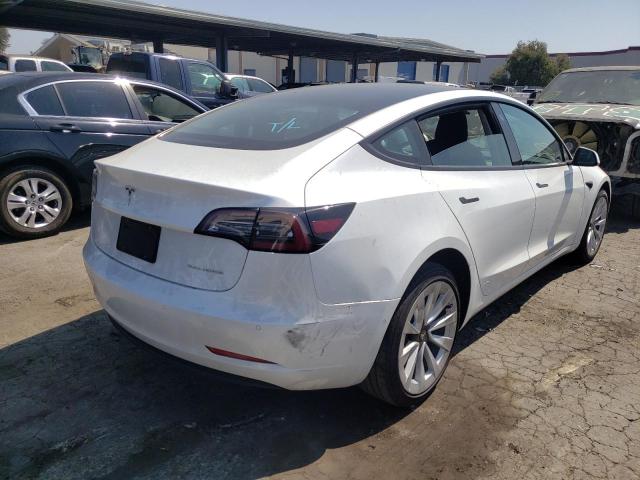 Photo 4 from auction – 2022 TESLA MODEL 3 with VIN 5YJ3E1EB5NF142576