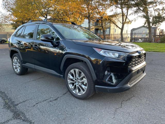 TOYOTA RAV4 XLE P 2019 with VIN JTMA1RFV4KD009286 - Photo from auction