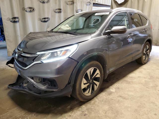 Photo 2 from auction – 2016 HONDA CR-V TOURI with VIN 5J6RM3H93GL017121