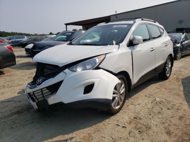 Photo 2 from auction – 2012 HYUNDAI TUCSON GLS with VIN KM8JUCAC9CU539096