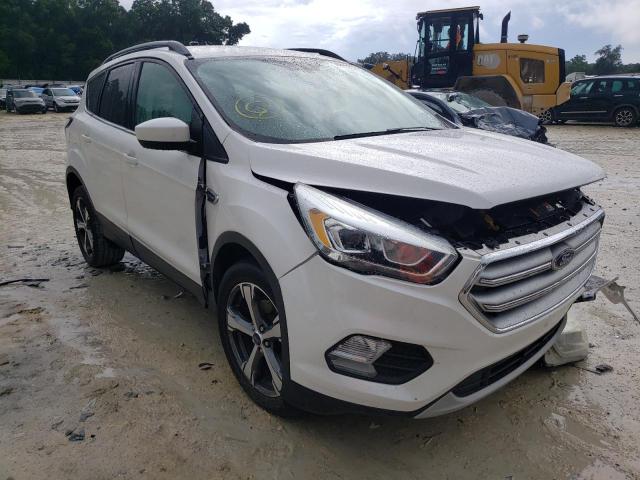 FORD ESCAPE SE 2017 with VIN 1FMCU0GD4HUB74373 - Photo from auction