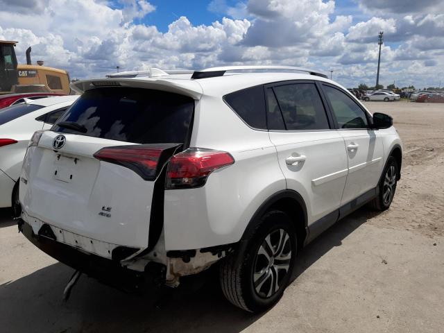 Photo 4 from auction – 2017 TOYOTA RAV4 LE with VIN 2T3BFREV2HW547410