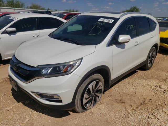 Photo 2 from auction – 2016 HONDA CR-V TOURI with VIN 5J6RM3H95GL004256