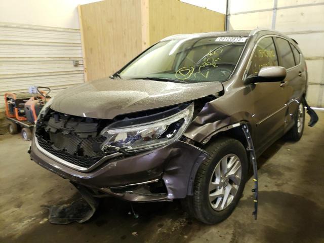 Photo 2 from auction – 2015 HONDA CR-V EXL with VIN 2HKRM4H74FH649980