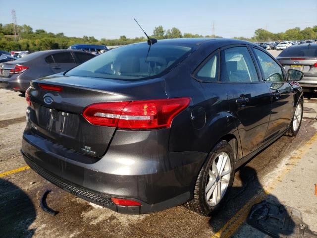 Photo 4 from auction – 2016 FORD FOCUS SE with VIN 1FADP3F24GL320315