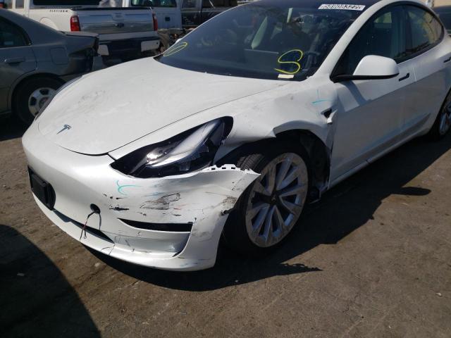 Photo 9 from auction – 2022 TESLA MODEL 3 with VIN 5YJ3E1EB5NF142576