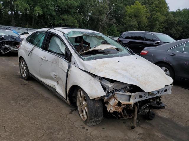 FORD FOCUS TITA 2014 with VIN 1FADP3J22EL367573 - Photo from auction