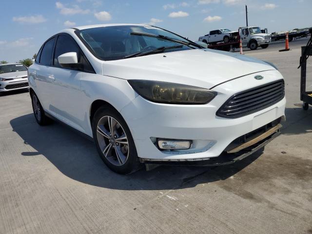 FORD FOCUS SE 2018 with VIN 1FADP3FE6JL311911 - Photo from auction