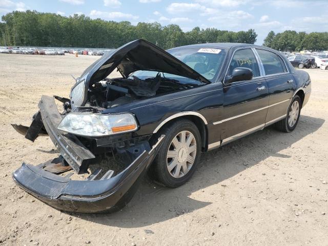 Photo 2 from auction – 2004 LINCOLN TOWN CAR U with VIN 1LNHM83W04Y604138
