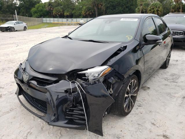 Photo 2 from auction – 2018 TOYOTA COROLLA L with VIN 5YFBURHE6JP748888