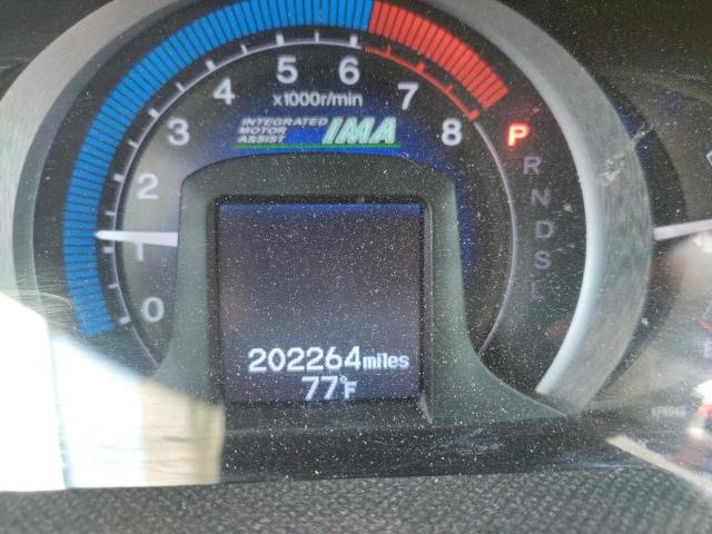 Photo 8 from auction – 2011 HONDA INSIGHT LX with VIN JHMZE2H57BS009269