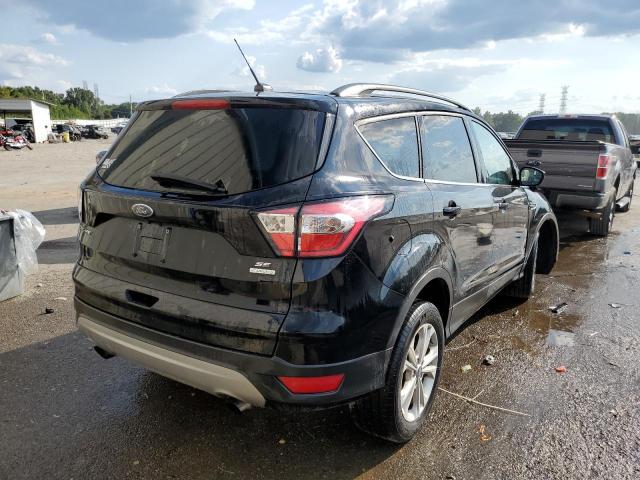 Photo 4 from auction – 2018 FORD ESCAPE SE with VIN 1FMCU0GD8JUB41205
