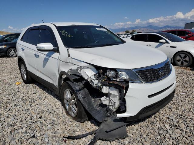 KIA SORENTO LX 2015 with VIN 5XYKTCA63FG582683 - Photo from auction