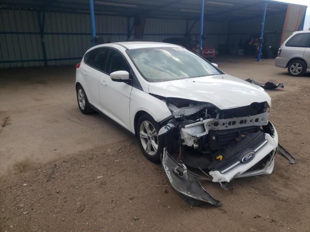 FORD FOCUS SE 2014 with VIN 1FADP3K28EL424809 - Photo from auction