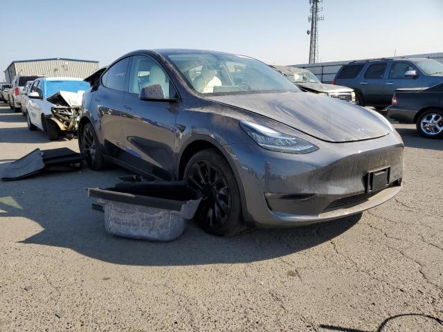 TESLA MODEL Y 2022 with VIN 7SAYGDEE4NF345831 - Photo from auction