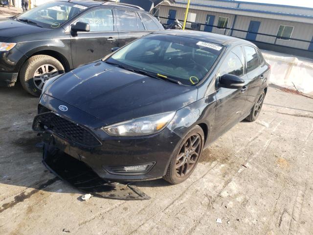 Photo 2 from auction – 2016 FORD FOCUS SE with VIN 1FADP3F21GL330266