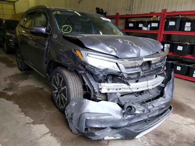 HONDA PILOT ELIT 2019 with VIN 5FNYF6H05KB002761 - Photo from auction