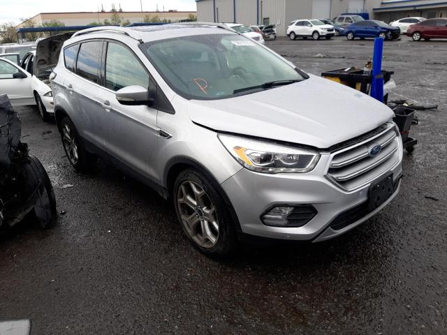 FORD ESCAPE TIT 2017 with VIN 1FMCU0J99HUC51016 - Photo from auction