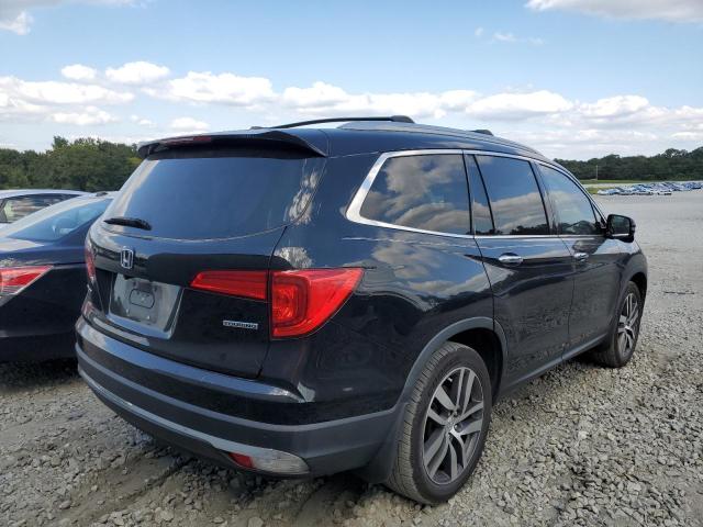 Photo 4 from auction – 2017 HONDA PILOT TOUR with VIN 5FNYF5H92HB007997