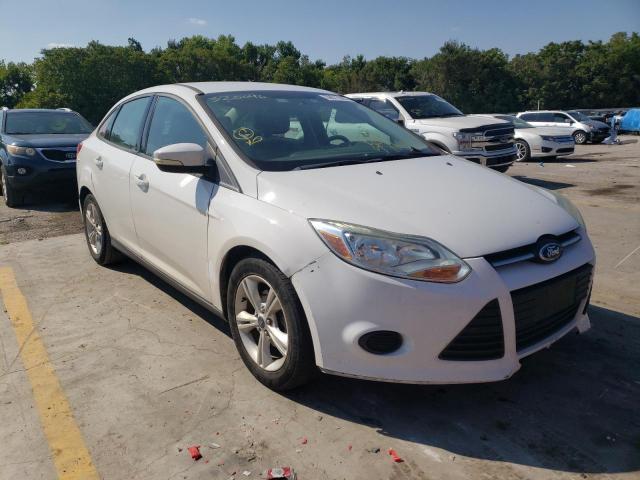 FORD FOCUS SE 2014 with VIN 1FADP3F20EL320406 - Photo from auction