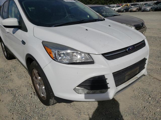 Photo 9 from auction – 2016 FORD ESCAPE SE with VIN 1FMCU9GXXGUC29096