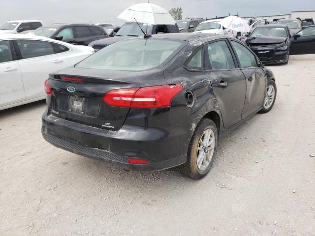 Photo 4 from auction – 2015 FORD FOCUS SE with VIN 1FADP3F23FL224075