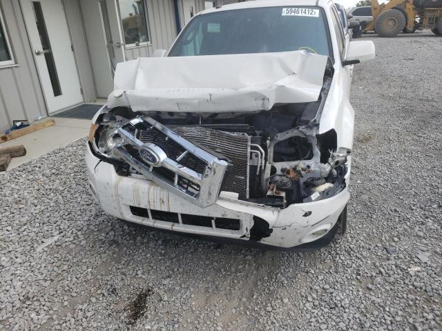 Photo 9 from auction – 2011 FORD ESCAPE LIM with VIN 1FMCU0EG1BKC69263