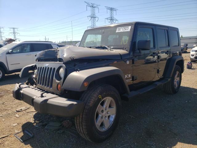 Photo 2 from auction – 2009 JEEP WRANGLER U with VIN 1J8GA39119L765747