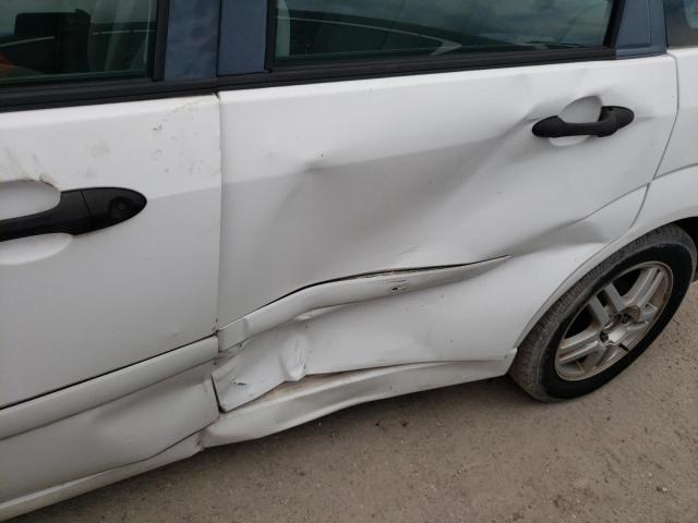 Photo 9 from auction – 2000 FORD FOCUS SE with VIN 1FAHP343XYW246363