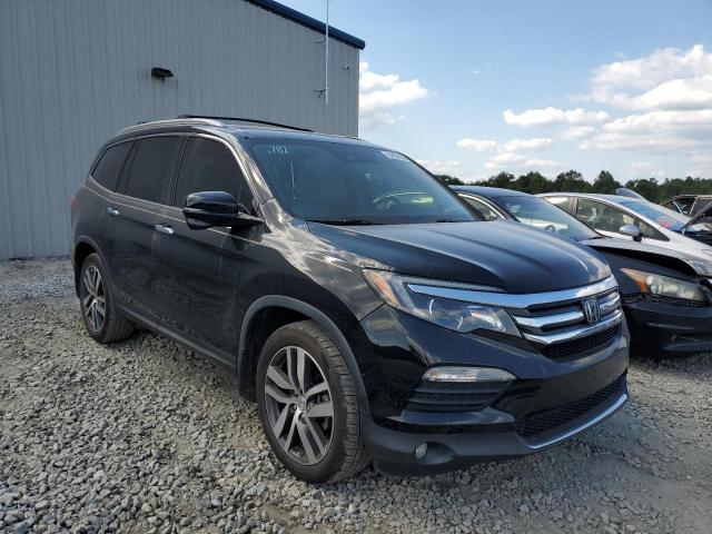 Photo 1 from auction – 2017 HONDA PILOT TOUR with VIN 5FNYF5H92HB007997