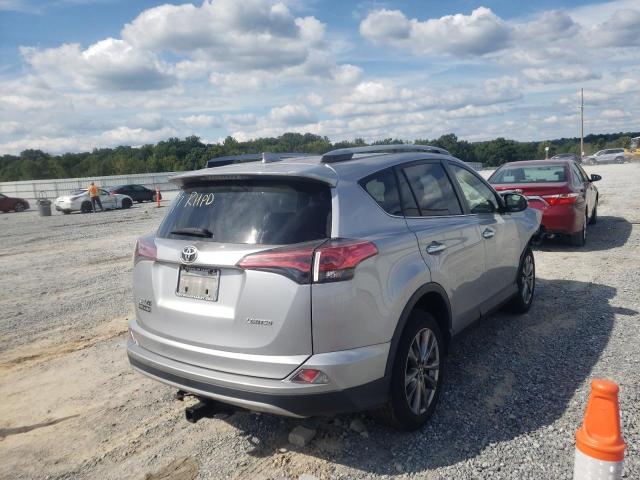 Photo 4 from auction – 2018 TOYOTA RAV4 LIMIT with VIN JTMYFREV5JD128562
