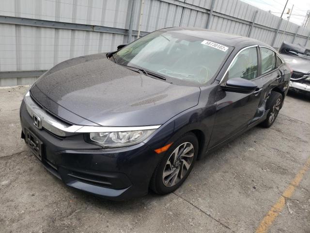 Photo 2 from auction – 2017 HONDA CIVIC EX with VIN 2HGFC2F70HH576391