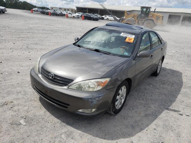 Photo 2 from auction – 2003 TOYOTA CAMRY LE with VIN 4T1BE30KX3U768915