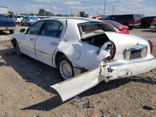 Photo 3 from auction – 1999 LINCOLN TOWN CAR E with VIN 1LNHM81W2XY632952