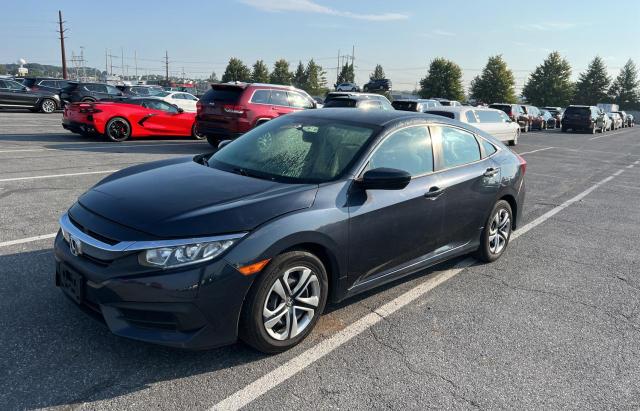 Photo 2 from auction – 2017 HONDA CIVIC LX with VIN 2HGFC2F5XHH572850