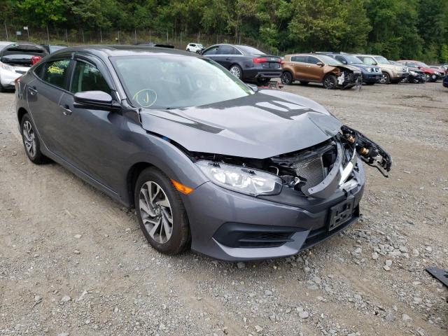 HONDA CIVIC EX 2018 with VIN 2HGFC2F77JH540218 - Photo from auction