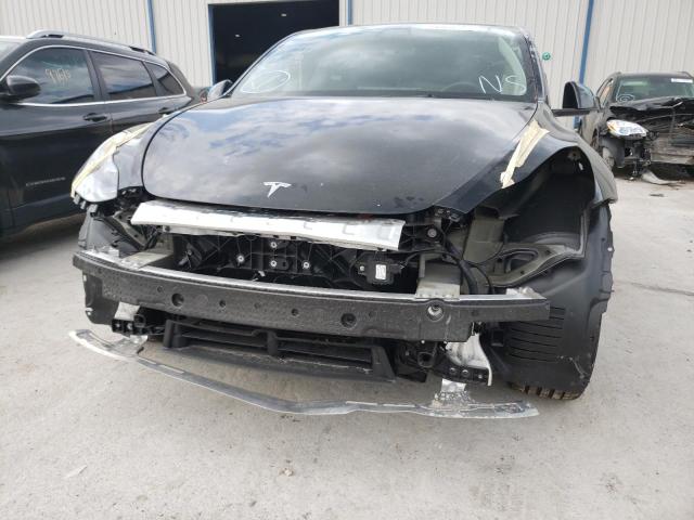 Photo 9 from auction – 2021 TESLA MODEL Y with VIN 5YJYGDEF7MF305621