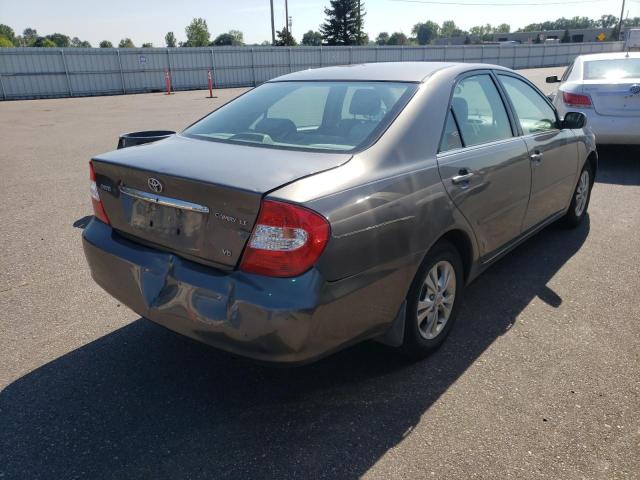 Photo 4 from auction – 2004 TOYOTA CAMRY LE with VIN 4T1BF32K84U569809