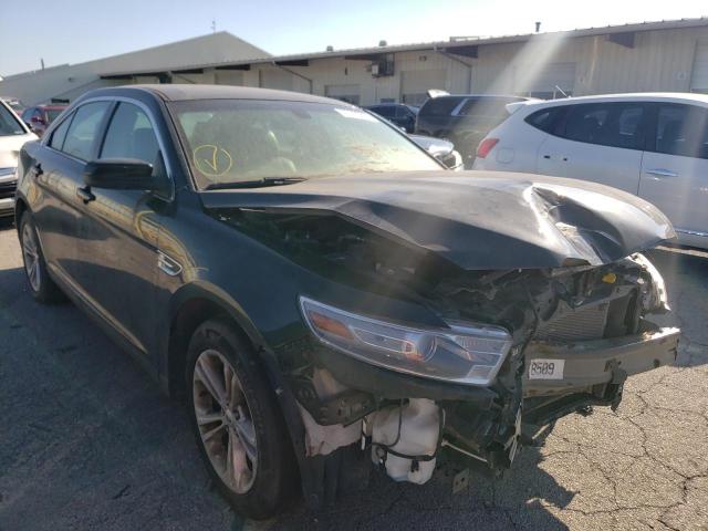 FORD TAURUS SEL 2014 with VIN 1FAHP2E83EG131968 - Photo from auction