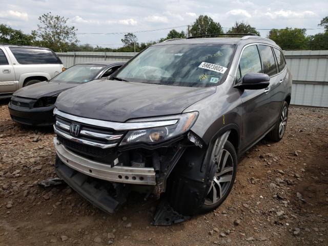 Photo 2 from auction – 2018 HONDA PILOT TOUR with VIN 5FNYF6H98JB026985
