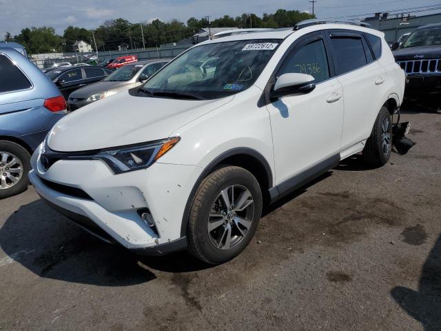 Photo 2 from auction – 2017 TOYOTA RAV4 XLE with VIN JTMRFREVXHJ705666