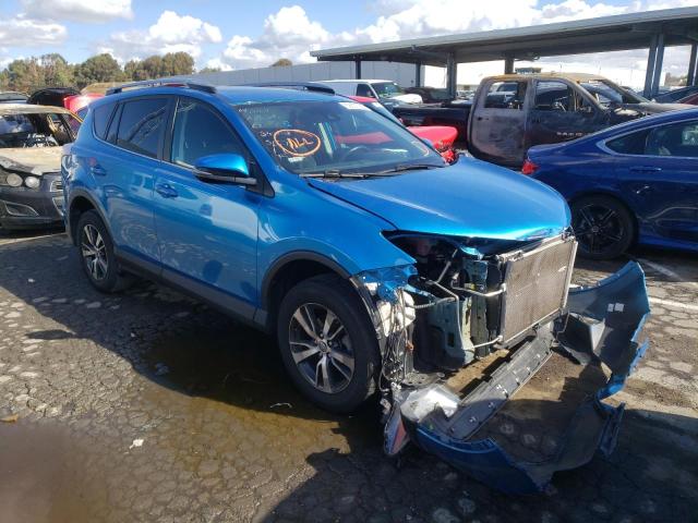 TOYOTA RAV4 XLE 2017 with VIN 2T3WFREV9HW389486 - Photo from auction