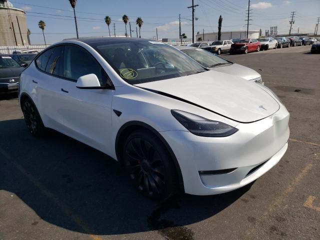 TESLA MODEL Y 2022 with VIN 7SAYGDEF8NF405439 - Photo from auction