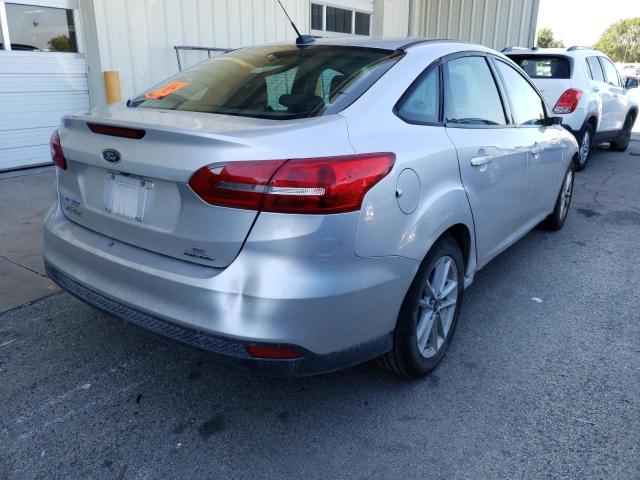 Photo 4 from auction – 2016 FORD FOCUS SE with VIN 1FADP3F29GL211946