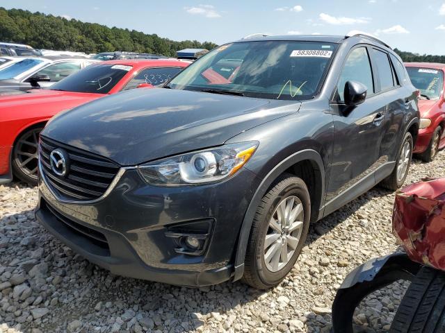 Photo 2 from auction – 2016 MAZDA CX-5 TOURI with VIN JM3KE2CY3G0611746