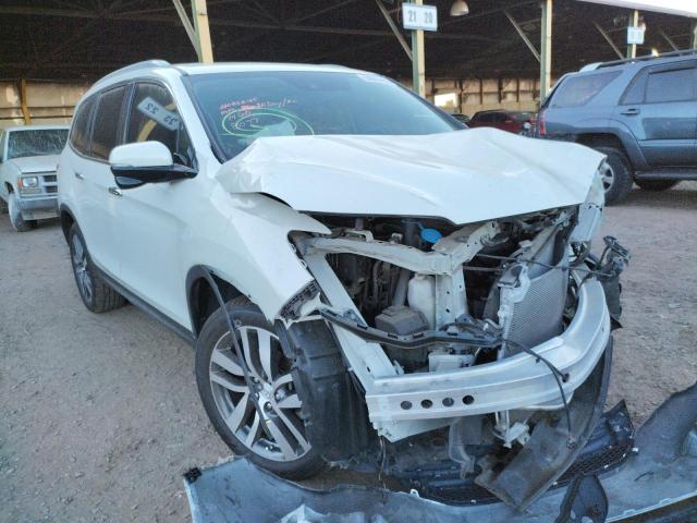 Photo 1 from auction – 2016 HONDA PILOT TOUR with VIN 5FNYF5H97GB038077