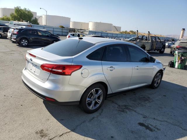 Photo 4 from auction – 2018 FORD FOCUS SE with VIN 1FADP3F21JL226013