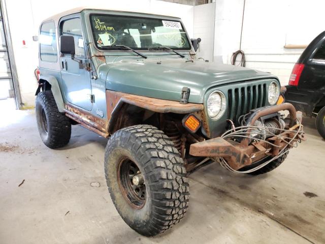 JEEP WRANGLER / 2000 with VIN 1J4FA49S4YP760951 - Photo from auction