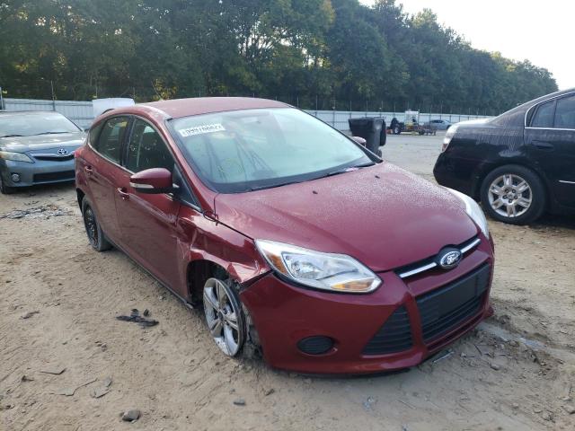 FORD FOCUS SE 2014 with VIN 1FADP3K21EL421959 - Photo from auction