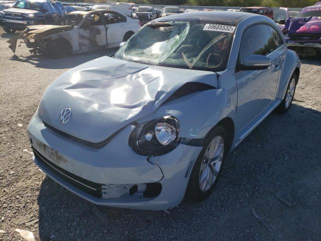 Photo 2 from auction – 2014 VOLKSWAGEN BEETLE with VIN 3VWJL7AT6EM609592